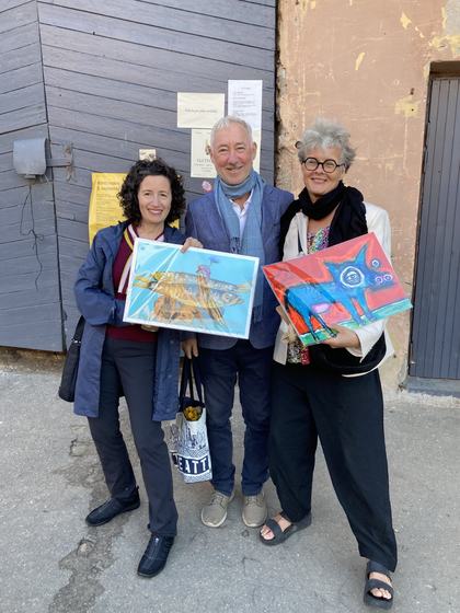Two paintings go home