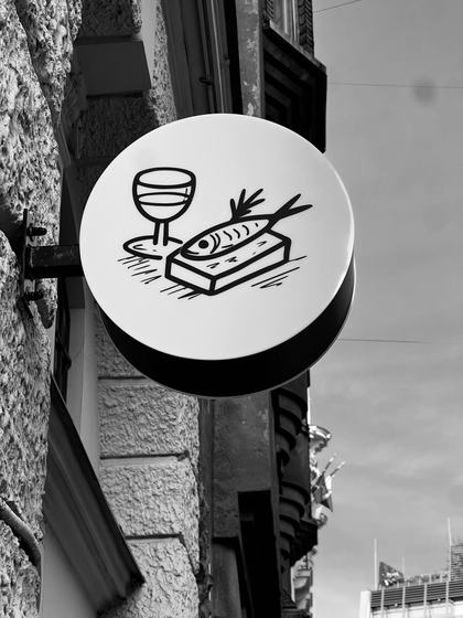 Wine and a fish sandwich
